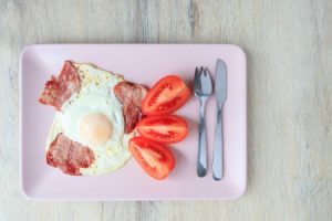 A Healthy Full Irish Brekfast includes Bacon, Egg and Tomato