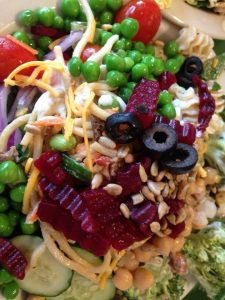 Summer salad with peas, beetroot and healthy vegetables